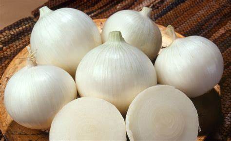 7 a: White onions by the kilo